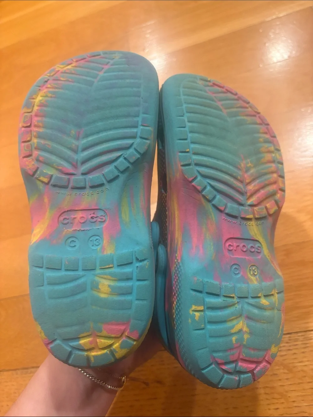 CROCS Kids Clog in Teal with Yellow & Pink Swirl Accents